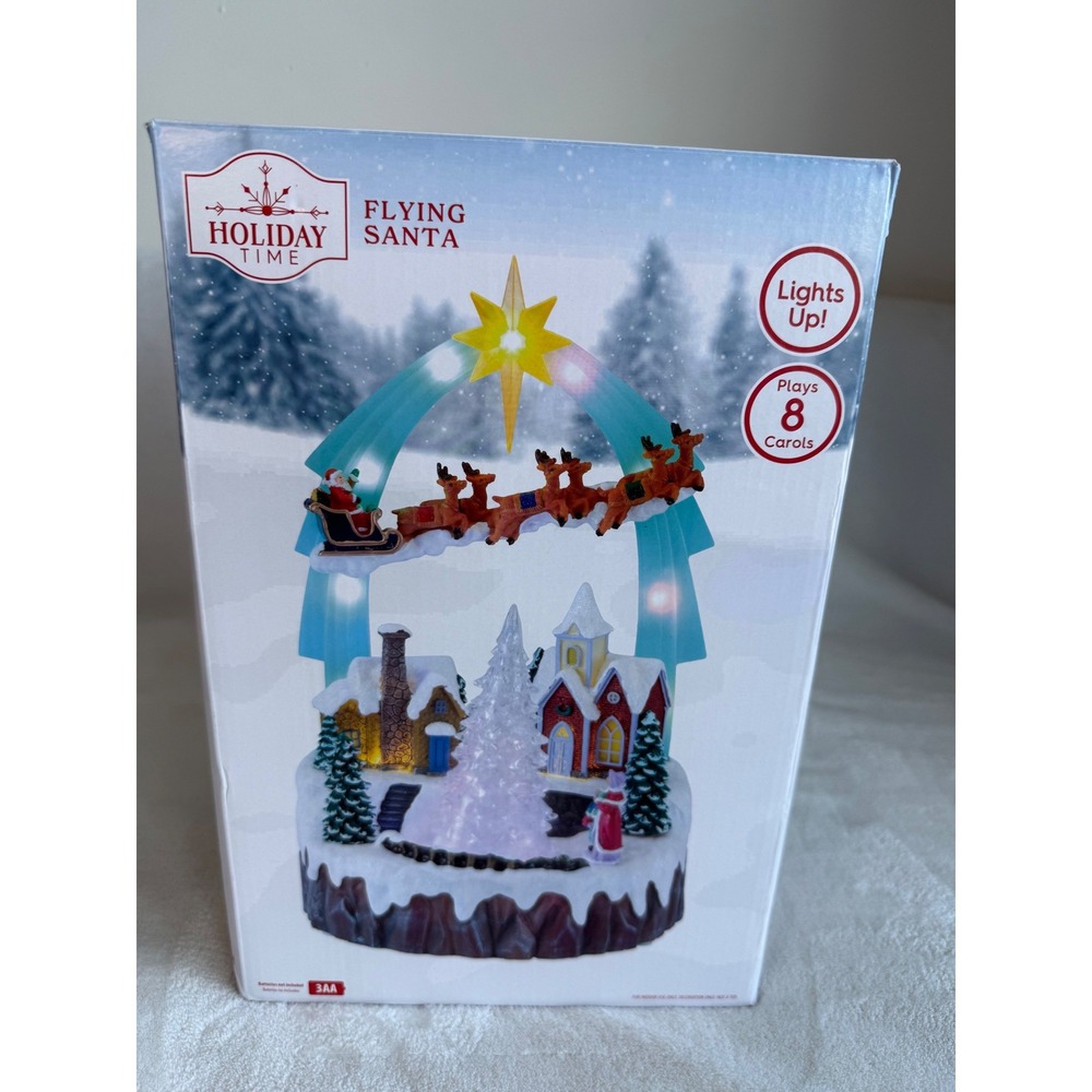 New Holiday Time Musical Flying Santa Lights Up Plays 8 Carols 11..5" Tall‎